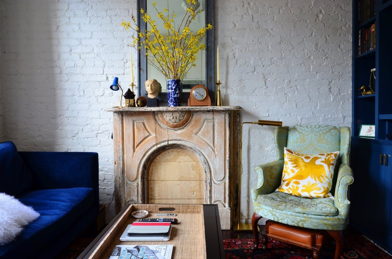 rustic wood fireplace small nyc apartment