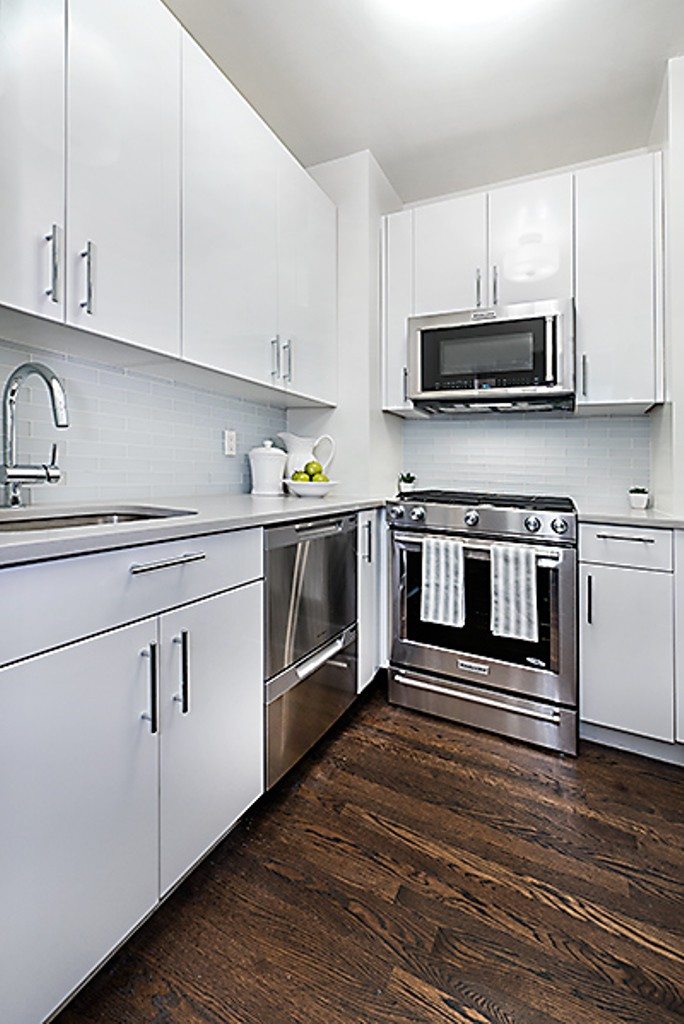 NYC Trends: Kitchen Backsplashes - Go classic with a natural stone backsplash. Kitchen Remodel by MyHome Design & Remodeling