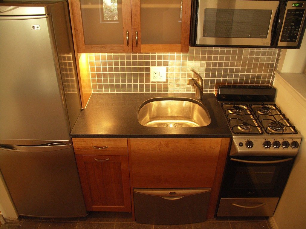 NYC Trends: Kitchen Backsplashes - Change it up with a copper or metal backsplash. Kitchen Remodel by MyHome Design & Remodeling