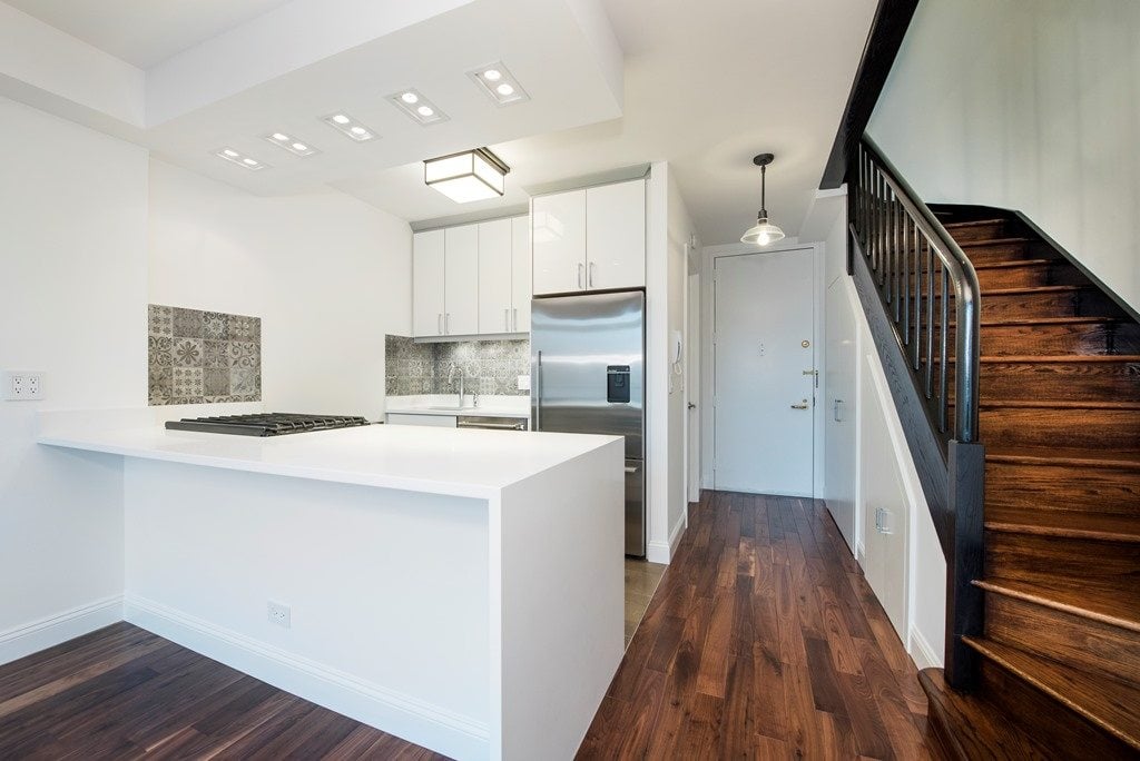 white waterfall countertop