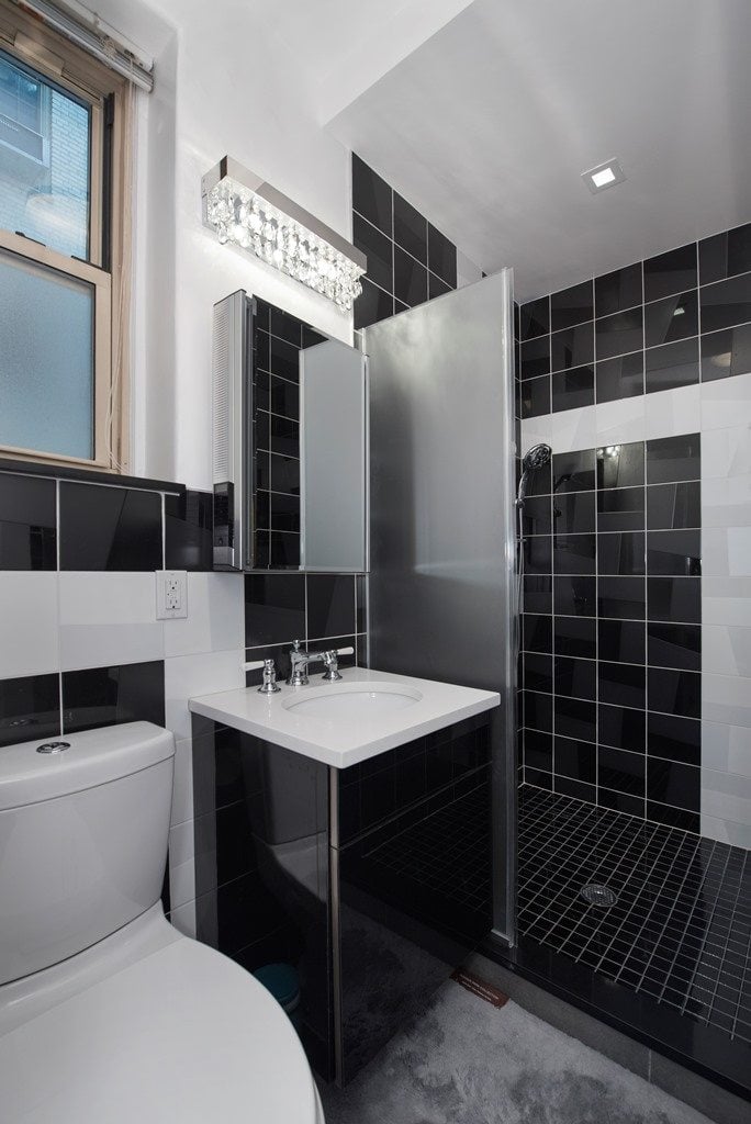 white bathroom with black elements