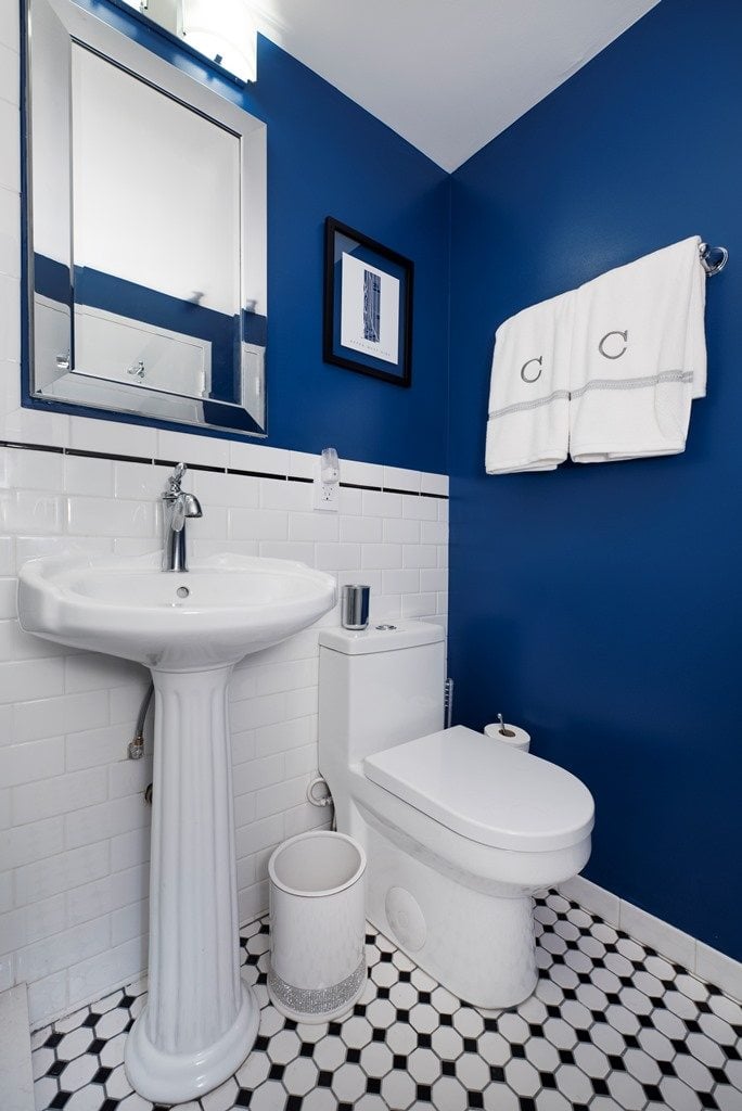 white bathroom with blue elements