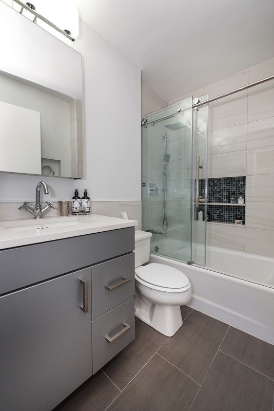 white bathroom with darker elements