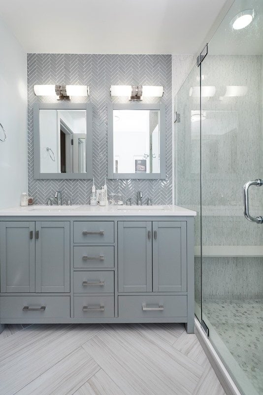 bathroom with herringbone & chevron tile patterns