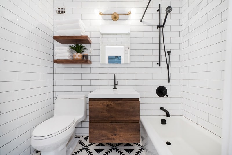 white bathroom with darker elements