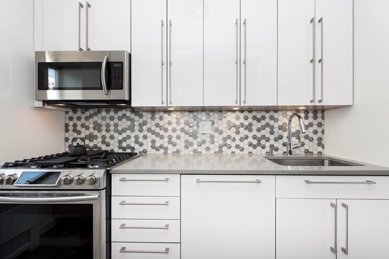 elegant kitchen with contrasting shades of grey