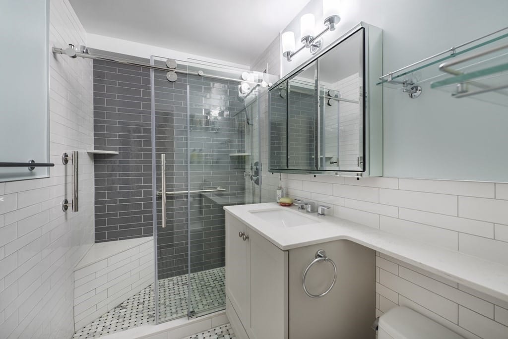 white bathroom with dark elements