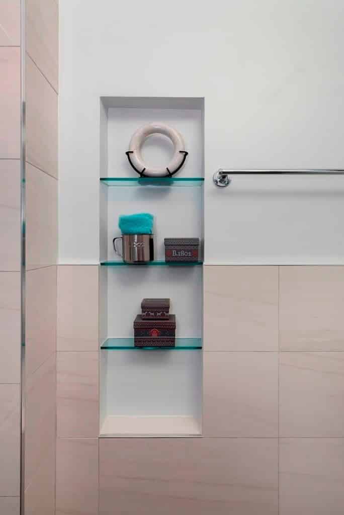 using a wall in bathroom as a storage 