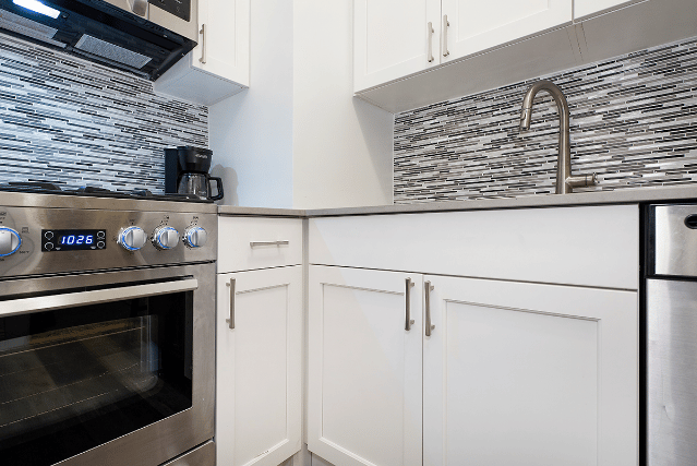 white kitchen cabinets with brighter elements