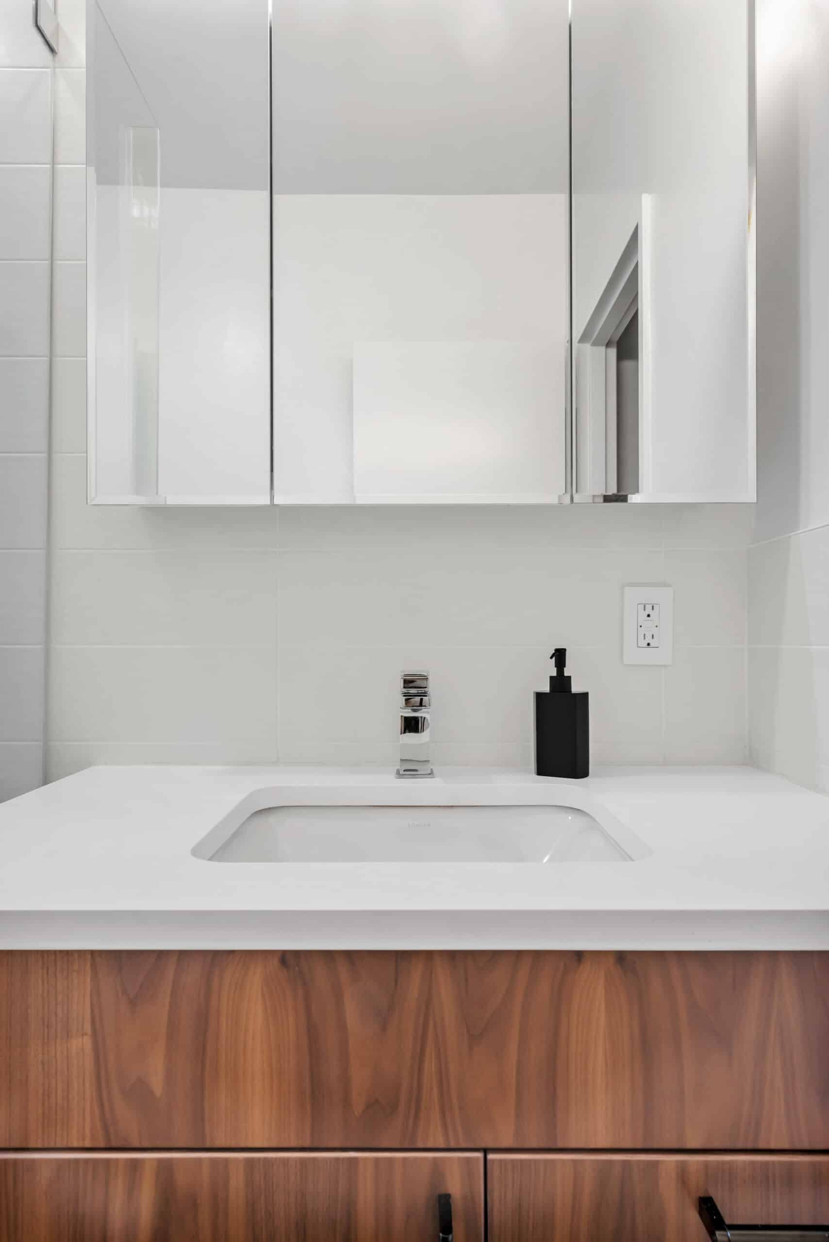 bathroom white basin with spout, mirror cabinet