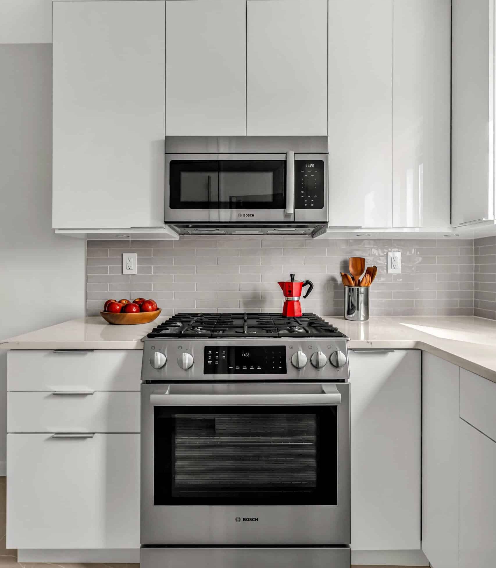 microwave oven appliance fitted in kitchen