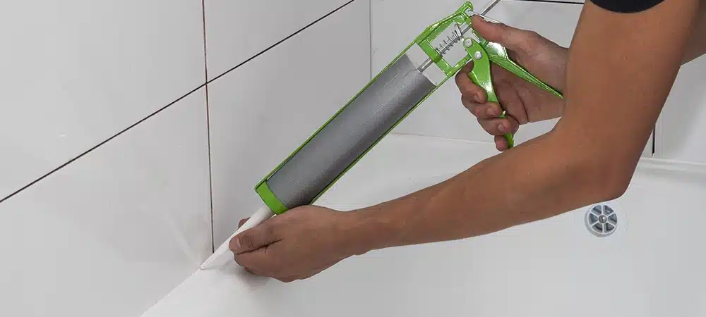 applying caulk