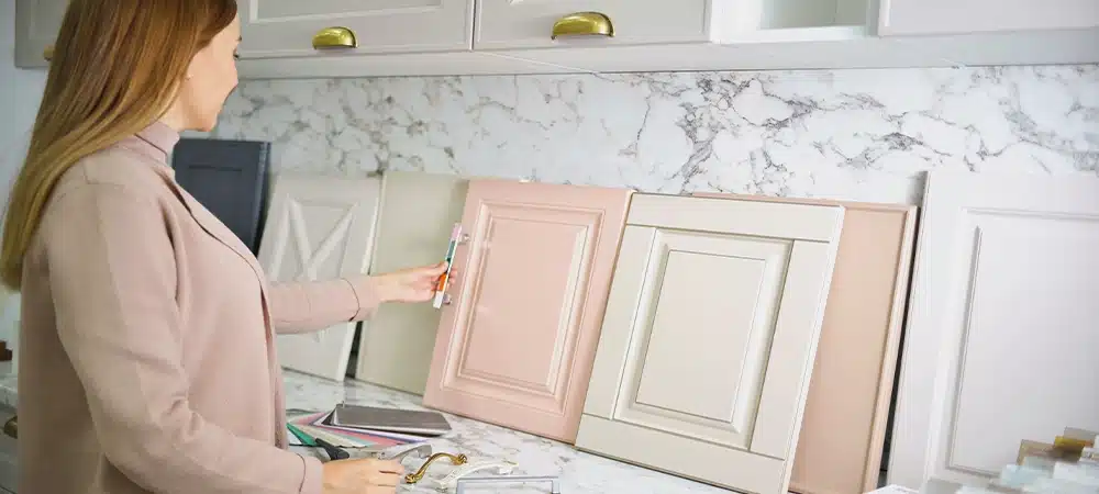 women choosing cabinets in showroom