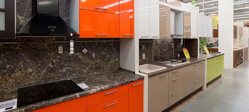 modern kitchen setups displayed in a home renovation showroom