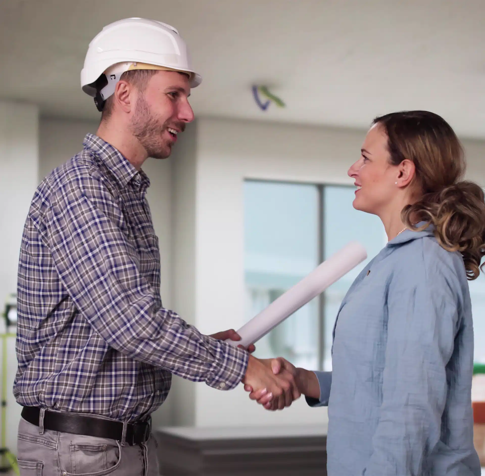Home Owner And Contractor Handshaking