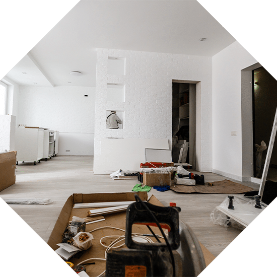 Home Renovation In Room Full Of Painting Tools