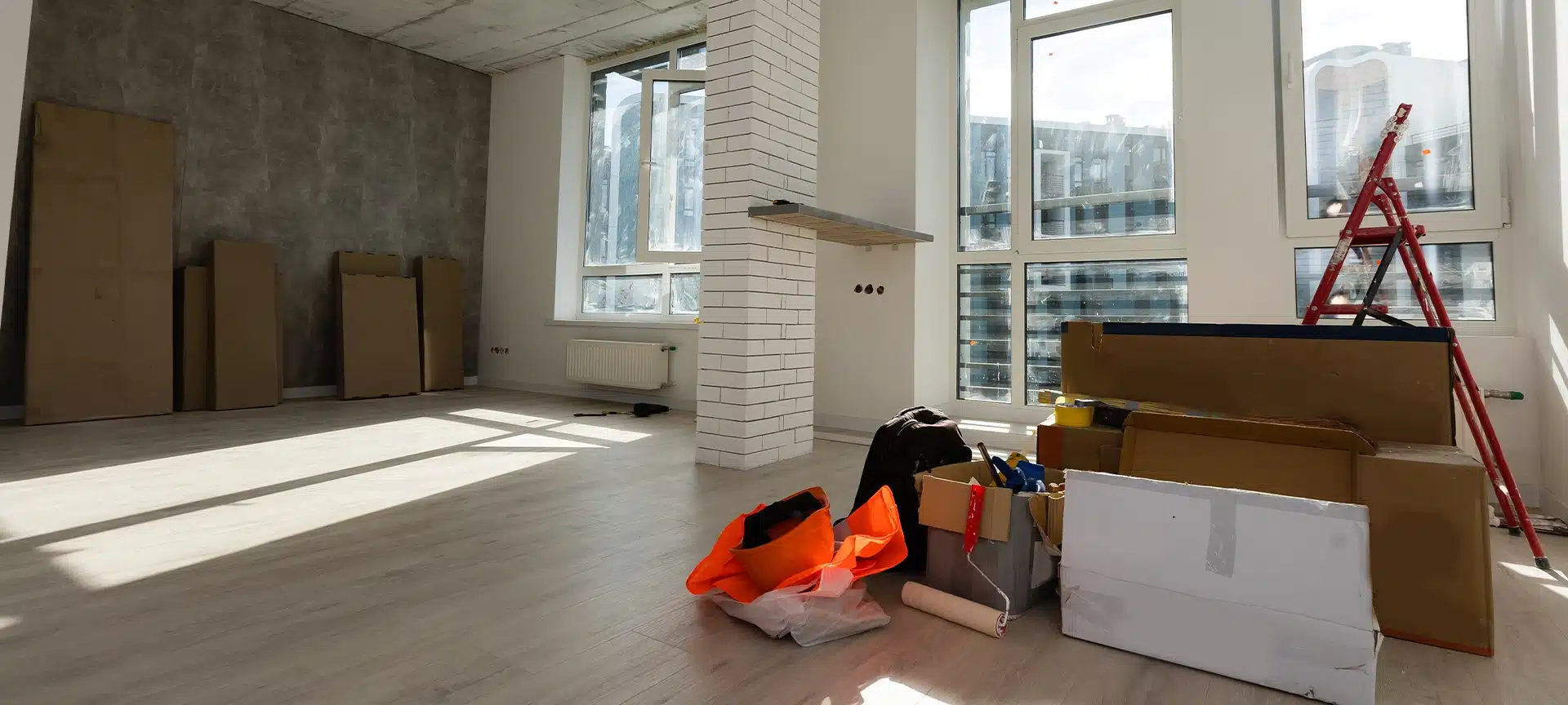 Interior of apartment with materials during on the renovation and construction, remodel wall from gypsum plasterboard or drywall