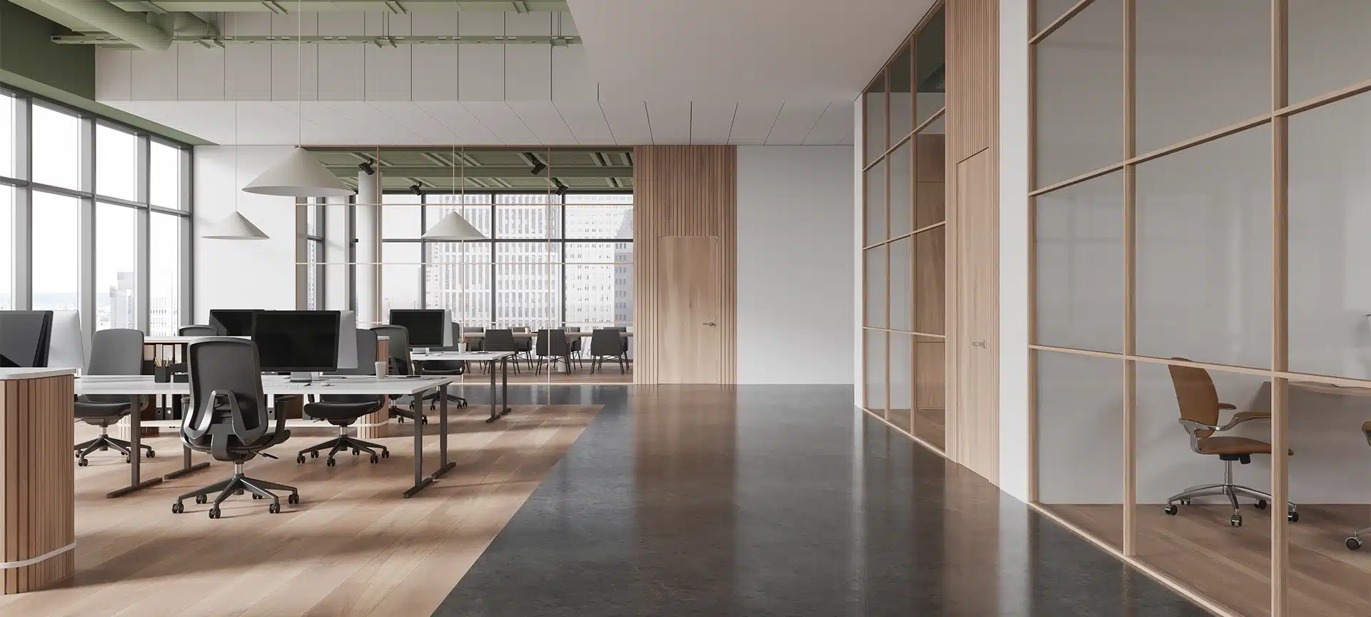 A modern office interior with an open space layout, featuring minimalist desks, chairs, glass partitions, and large windows. Bright and spacious concept. 3D Rendering