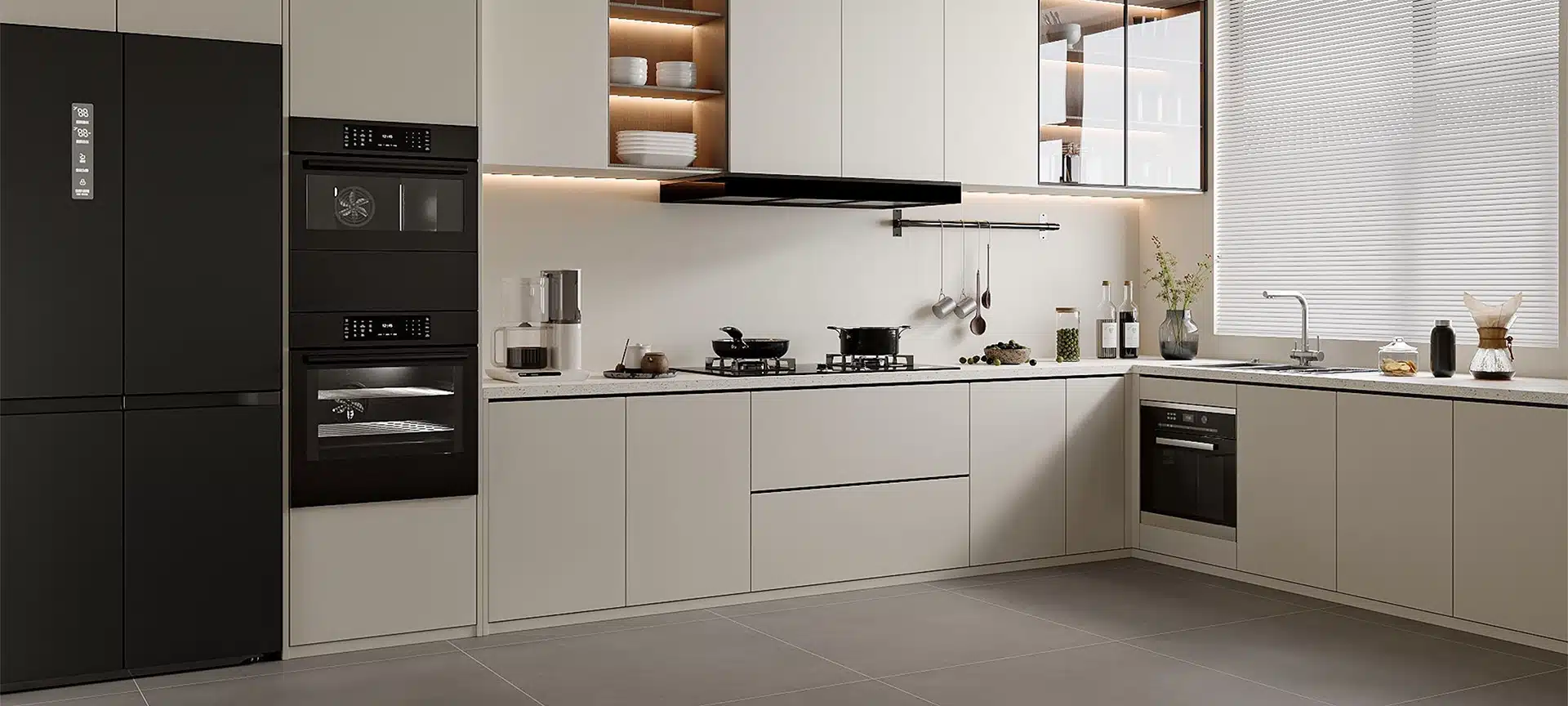 A sleek and functional modern kitchen featuring light-colored flat-panel cabinetry, integrated black appliances, and ample counter space, designed for contemporary living and entertaining