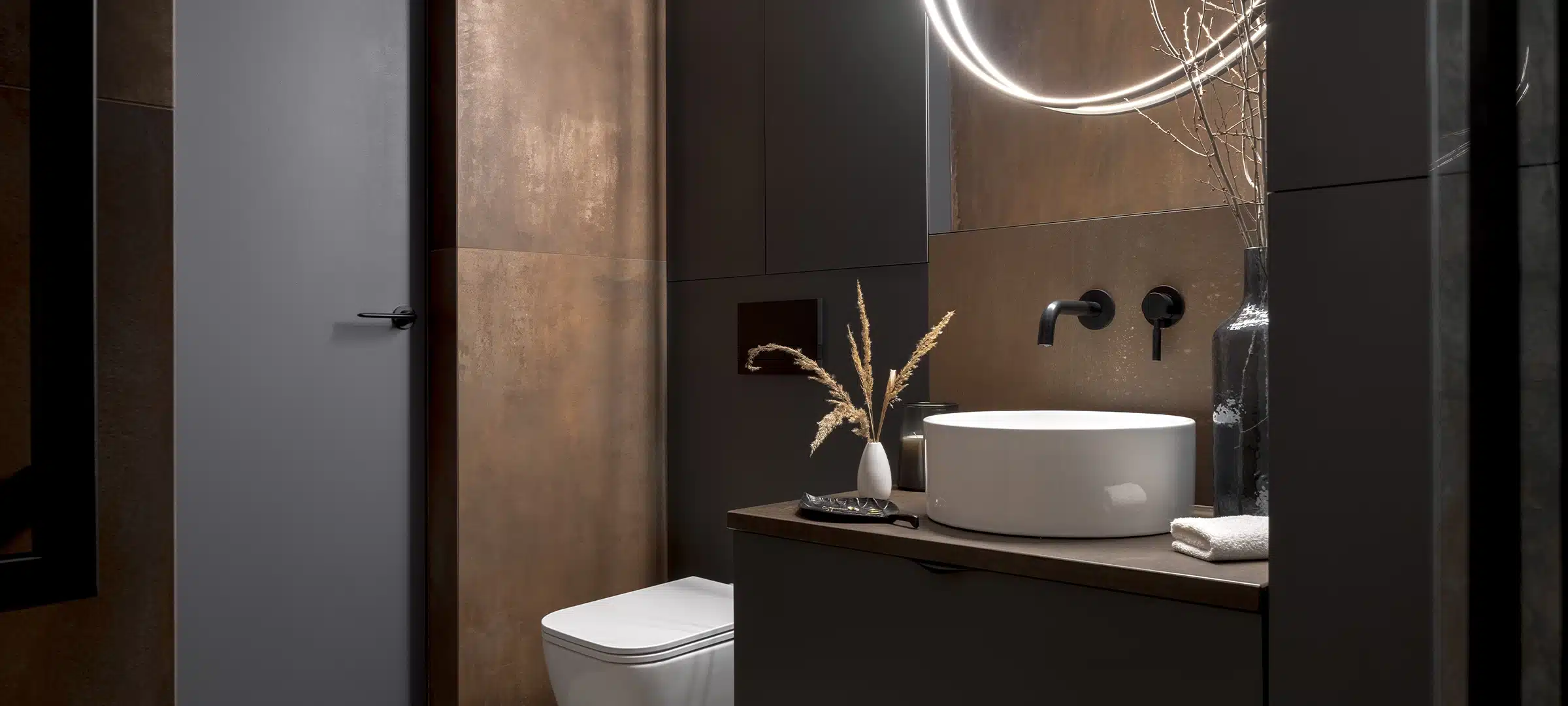 Modern bathroom with rusty tiles, stylish lighting and elegant decorations