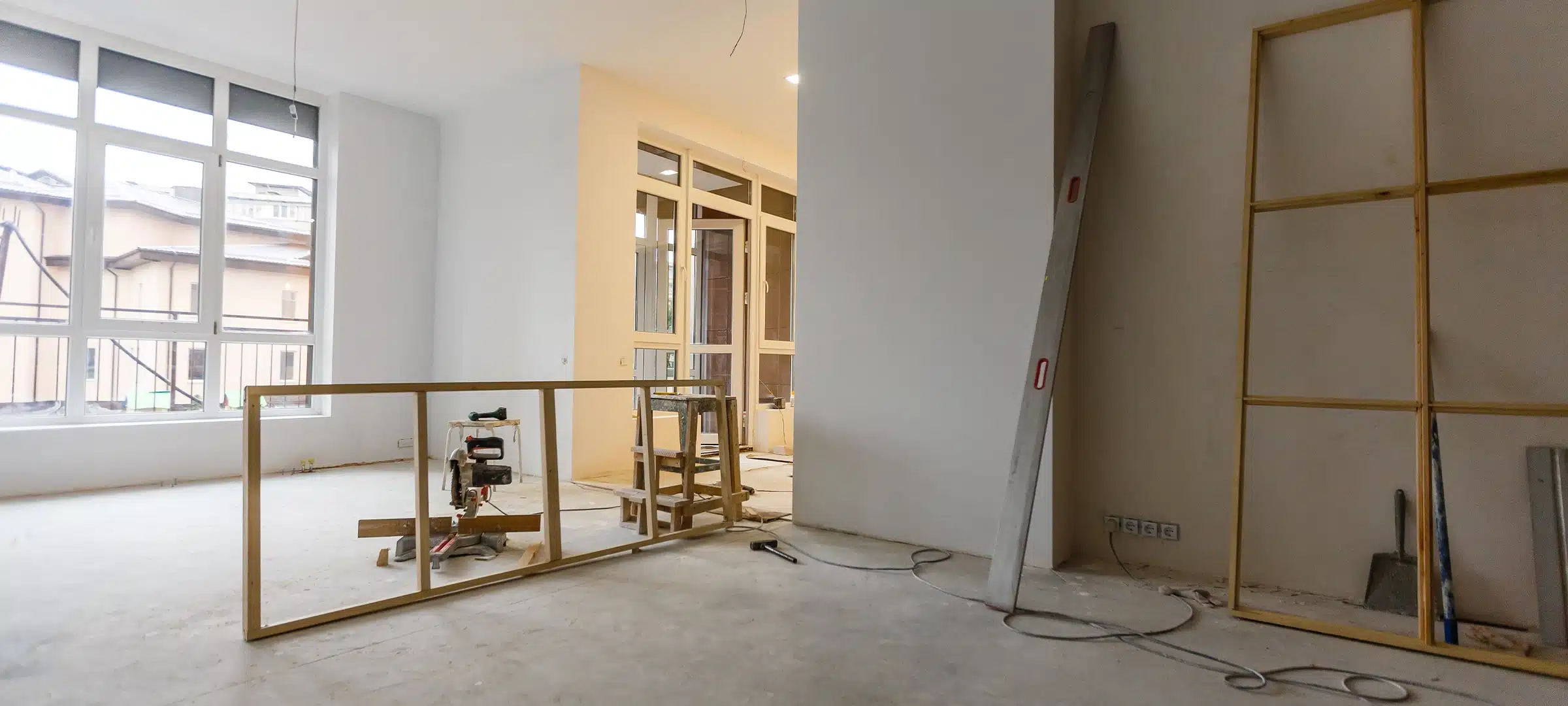 Home renovation in room full of painting tools