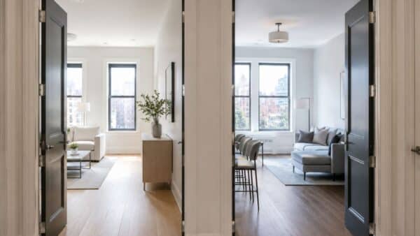 Combined Manhattan apartment designed with continuous flooring and circulation so two former units read as one home.