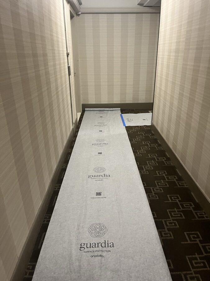 During the work at 220 Madison Avenue: The building corridor, protected end to end for the length of the job.